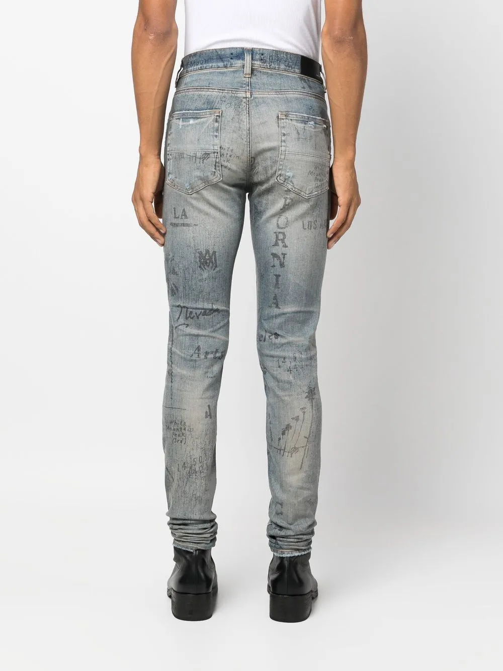 AMIRI slim-fit illustration print jeans