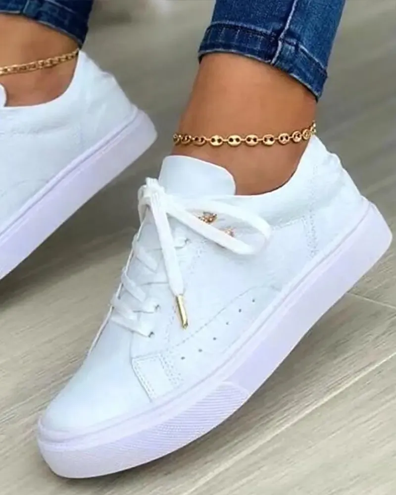 Chic sneakers with gold details