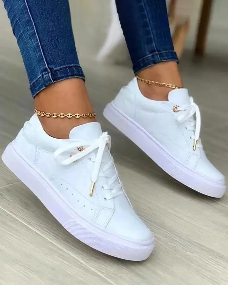 Chic sneakers with gold details