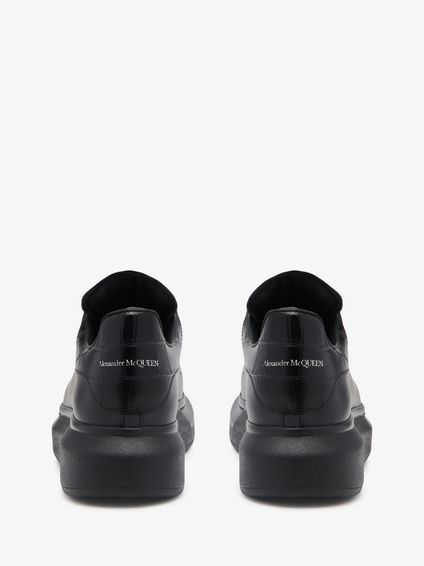 Oversized sneakers in black and white crocodile