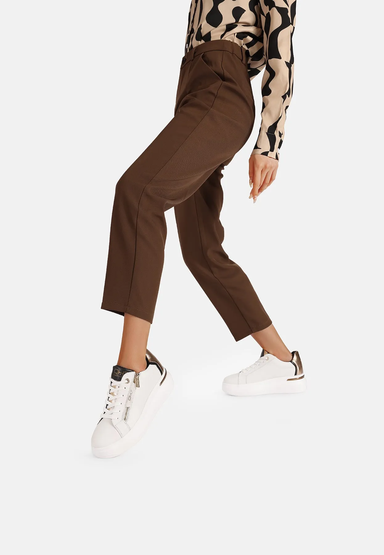 Sneakers in vera pelle con suola alta QH8004