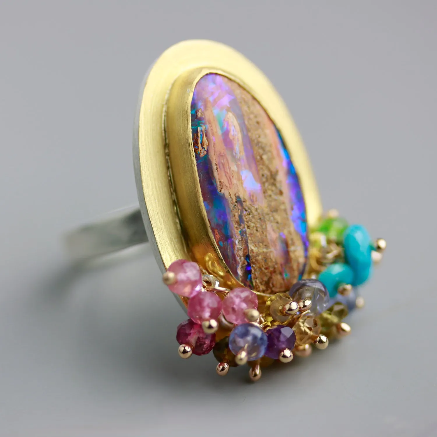 SOLD   Fossilized Wood Opal Tall Oval Ring with Turquoise and Tourmaline Fringe. Size 7 3/4.