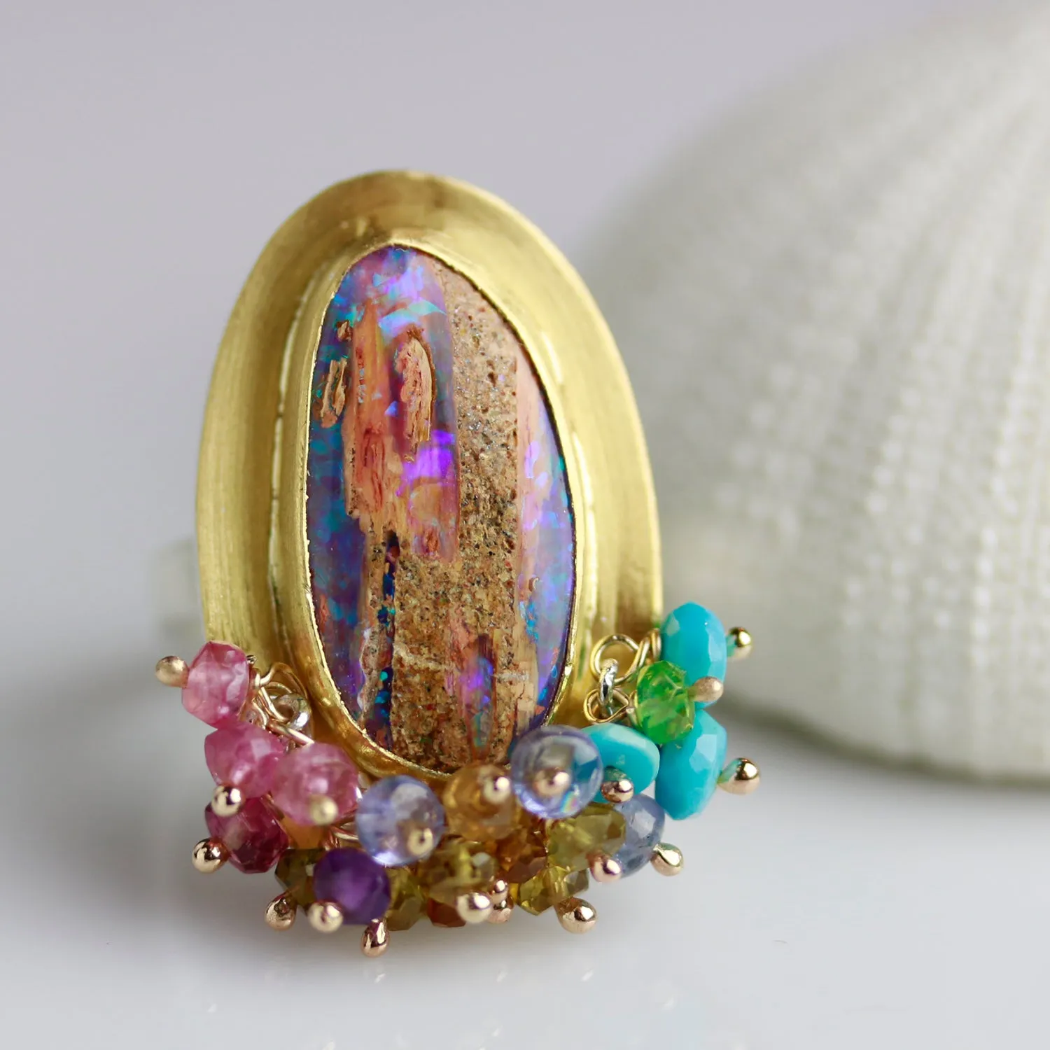SOLD   Fossilized Wood Opal Tall Oval Ring with Turquoise and Tourmaline Fringe. Size 7 3/4.